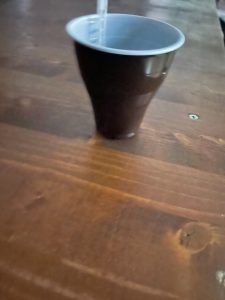unstable coffee machine cup poor product design example